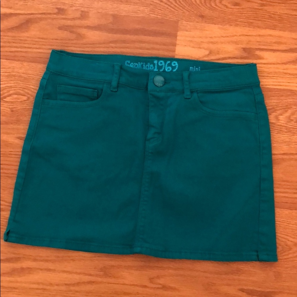 Green denim mini skirt